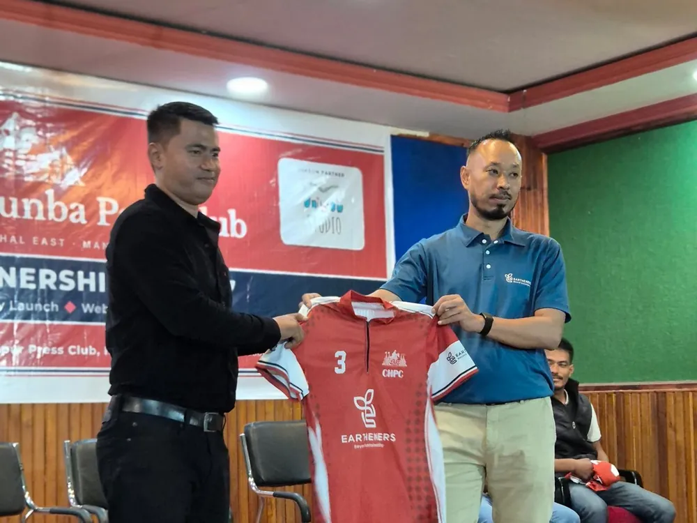 Soraisam Devakishor Singh hands over a jersey for the 2026–27 season